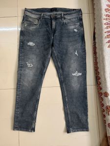 Distressed Denim Jeans