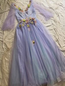 Elegant Lavender Gown with Floral Embellishments