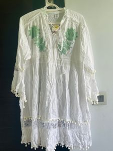 Beautiful white with green work middy ..