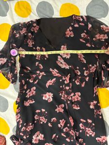 Black dress with pink floral print