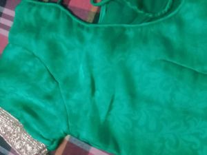 Elegant Green Saree with Golden Embroidery