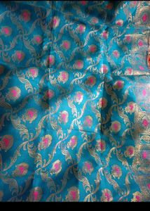 Elegant Teal Saree with Gold &amp; Pink Motifs