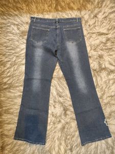 Whimsical Floral Embroidered Denim Jeans