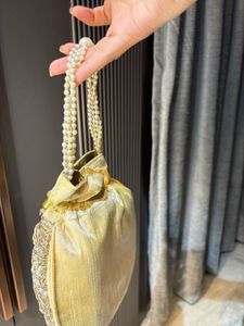 Elegant Gold Embellished Clutch