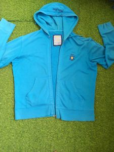 Blue Zip-Up Hoodie with Crest Logo