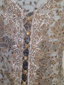 Elegant Beige gown with heavy jacket and dupattaDr