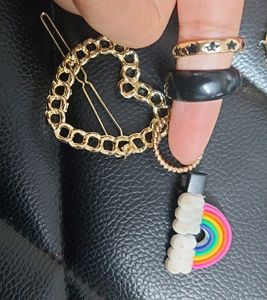 Set Of Three Rings And Two Clips