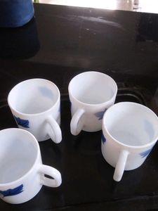 Set of 4 White Mugs with Blue Floral Design