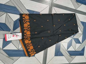 Elegant Black Saree with copper zariFloral Border