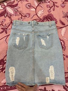 Light Wash Ripped Denim Skirt