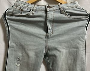 Light Wash Ripped Jeans with Side Stripe