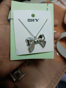 Silver Bow Pendant Necklace