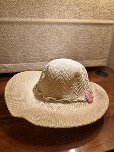 Chic Straw Sun Hat with Flower Accent