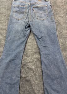 Distressed Blue Denim Jeans