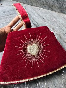 Elegant Red Velvet Clutch with Heart Design