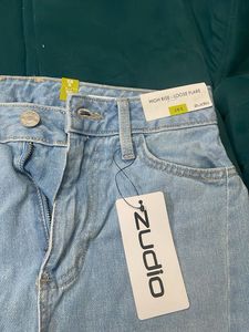 Light Wash Flared Jeans with Side Slits