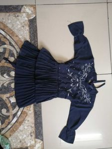Embroidered Peplum Top