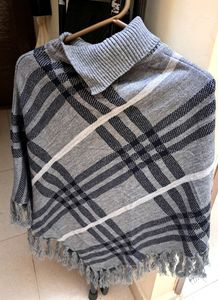Beautiful Knit Poncho With Pattern Detailing