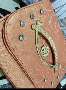 Elegant orange Embellished Sling Bag