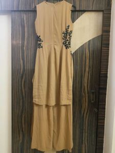 Elegant Beige Jumpsuit with Embellishments
