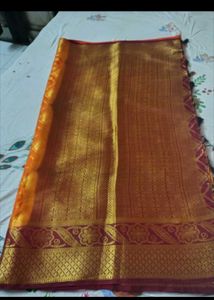 Orange Silk Saree with Golden Border