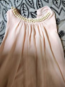 Pink Top with Cut-Out Detail