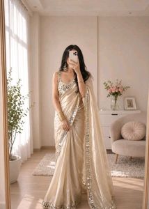 Elegant Cream Saree with Embellished Blouse