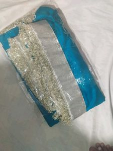 Beautiful Teal Saree with Silver Border