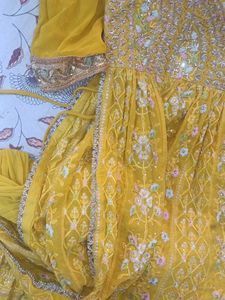 Nyra cutYellow Embroidered kurta Choli Set