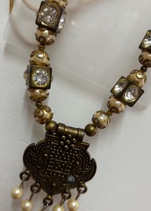 Elegant Beaded Necklace with Pendant