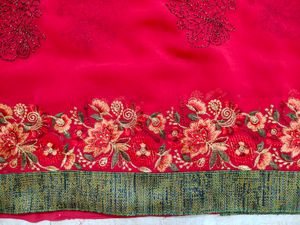 Rani Pink Embroidered Saree with stitched blouse