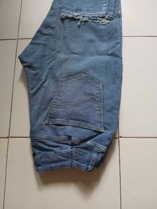 Distressed Blue Jeans with Paint Splatter
