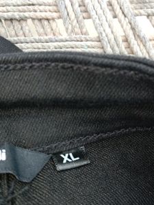 A Black Denim Jeans With 8 Pokets