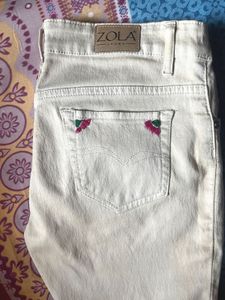 Stylish Beige Jeans with Floral Detail
