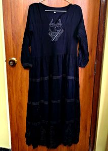 Elegant Tiered Black Maxi with Tribal Prints