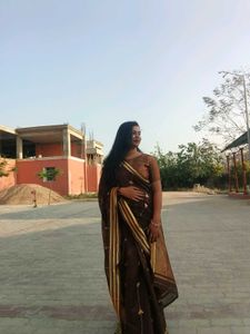 Elegant Brown Saree with Gold Border