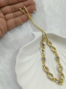 Sparkling Infinity Bracelet - Gold Tone