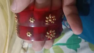 Red Bangles with Gold Floral Embellishments