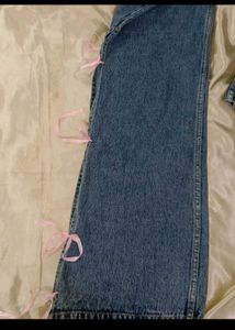 Blue Jeans with Pink Ribbon Detail
