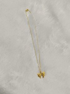 Gold Bow Pendant Necklace