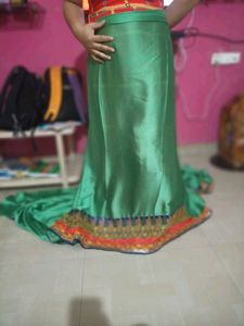 Title: Emerald Elegance: Lustrous Green Silk Saree
