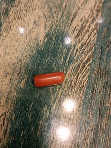 Red Bullet-Shaped Trinket
