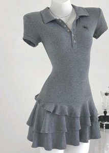 Chic Grey Polo Dress with Ruffle Skirt