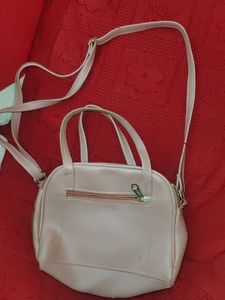 Peach Colour Hand Bag And Sling Also