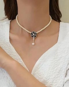 Elegant Pearl Necklace with Flower Pendant