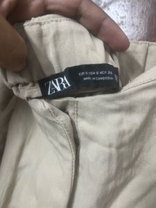 zara loose fitting darted trousers