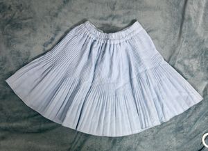 light blue pleated skirt