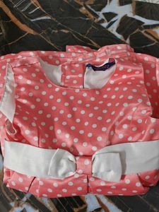 Cute peach Pink Polka Dot satin frock with Bow