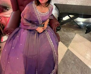 Tissue Lehenga with stiched blouse