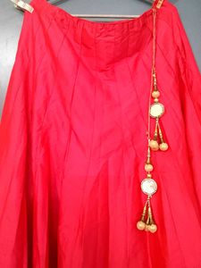 Red lehanga with stunning golden border